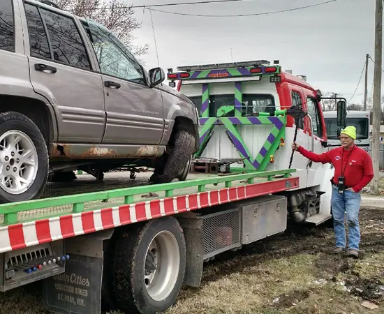 Putting SUV on Flat Bed Tow Truck